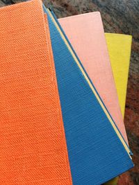 Close-up of stacked colorful books on table