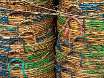 Full frame shot of stacked fishing baskets