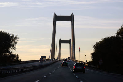 Cars on road against sky