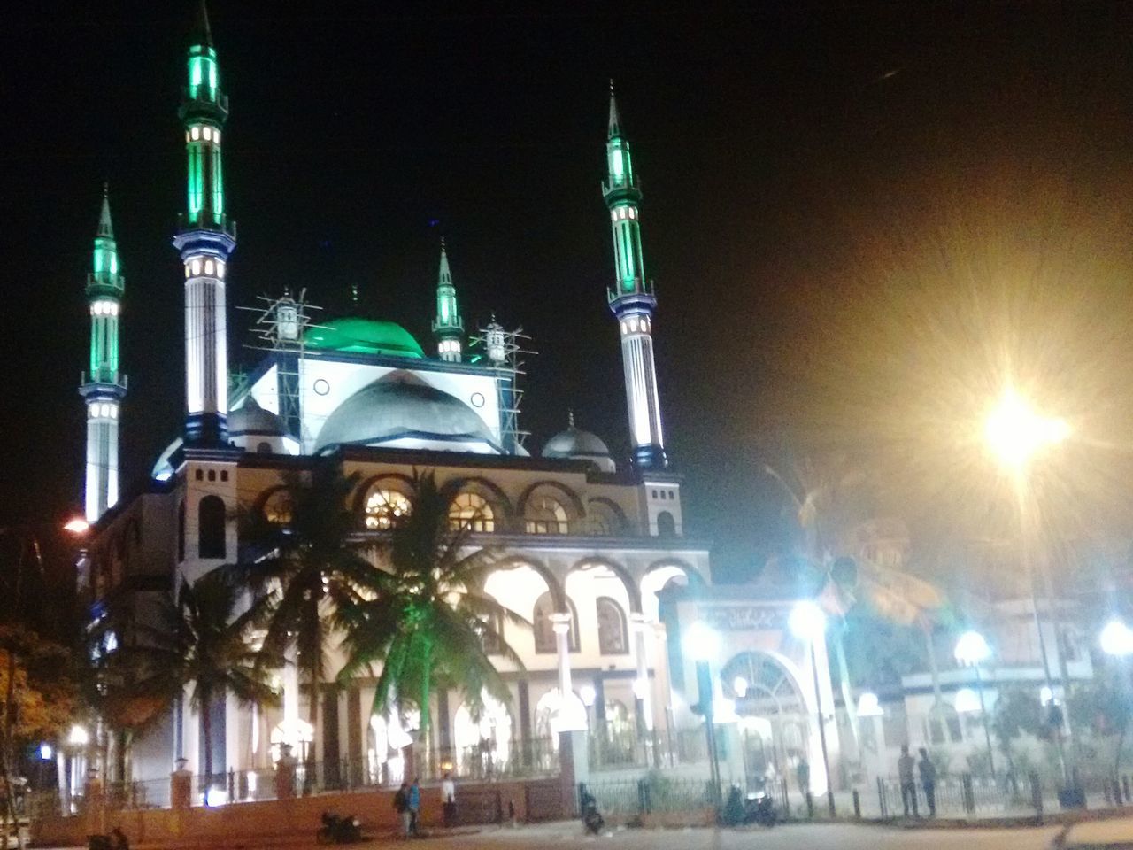 building exterior, architecture, built structure, night, illuminated, place of worship, church, religion, spirituality, low angle view, tower, city, famous place, travel destinations, cathedral, tourism, sky, clear sky