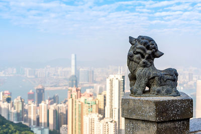 Chinese lion statue at victoria peak the famous viewpoint and tourist attraction in hong kong.