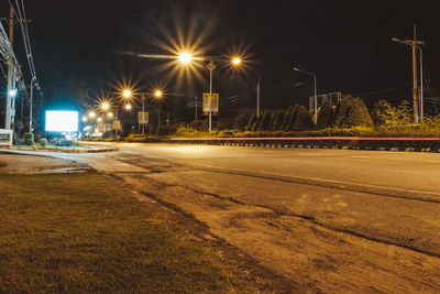 Illuminated road at night
