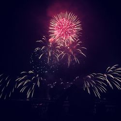 Low angle view of firework display