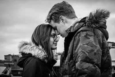 Side view of young couple outdoors