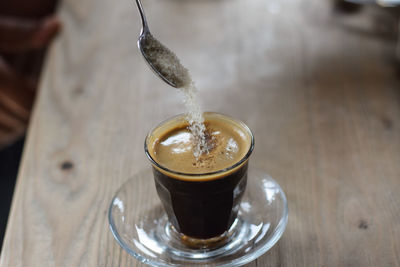 Close-up of coffee cup on table