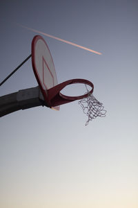 Low angle view of basketball hoop against sky