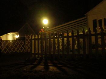 Illuminated street light at night