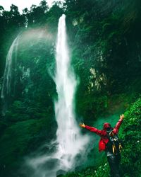 Scenic view of waterfall in forest