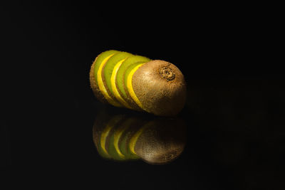 Close-up of bananas against black background