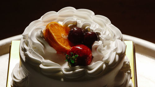 Close-up of cake served on table