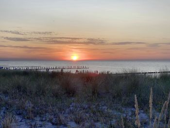 Scenic view of sea against sky during sunset