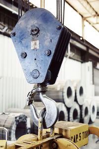 Close-up of hook over machine at industry