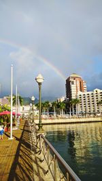 Rainbow over city