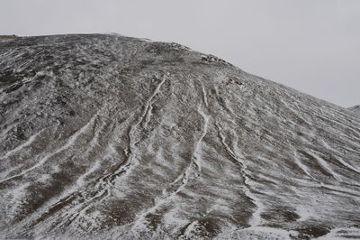 View of volcanic landscape against clear sky