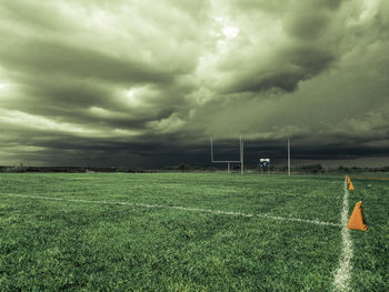 Scenic view of landscape against cloudy sky