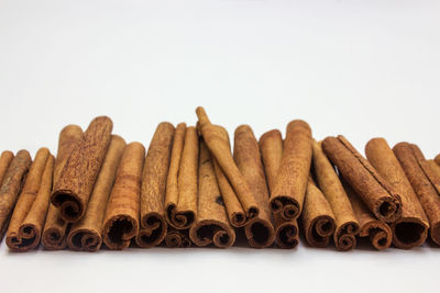 Close-up of fruit over white background