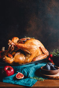 Close-up of roast turkey on table