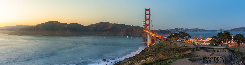 Panoramic view of bay against clear sky