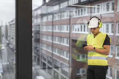 Worker using cell phone