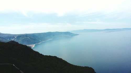 Scenic view of bay against sky