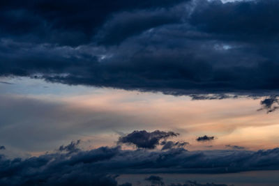 Low angle view of dramatic sky during sunset