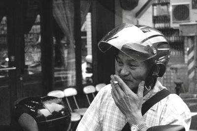 Woman photographing through camera