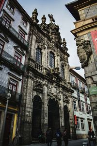 People in front of building