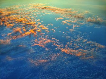 Full frame shot of sea against sky during sunset