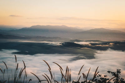 Scenic view of mountains against sky during sunset