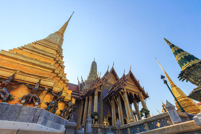 Low angle view of temple against building