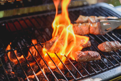 Close-up of meat on barbecue grill