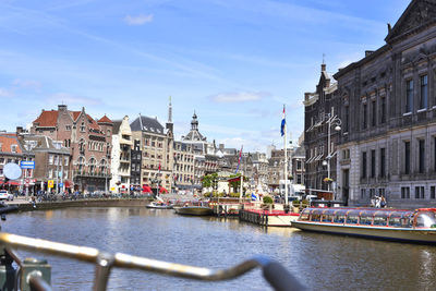 Canal passing through city buildings