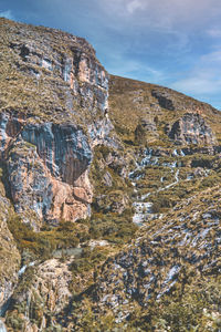 Scenic view of rocky mountains against sky