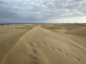 Scenic view of desert against sky