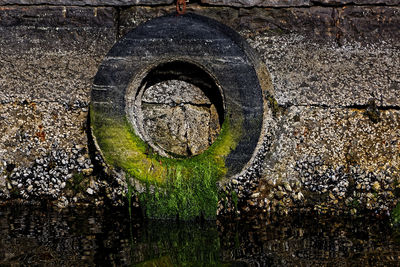 Close-up of old manhole