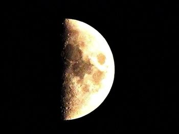 Moon over black background