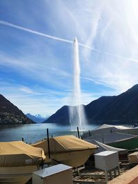 Panoramic view of lake and mountains against sky