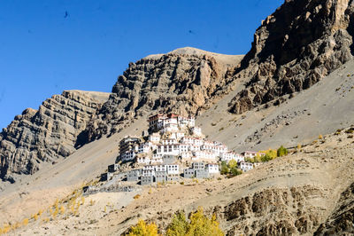 Scenic view of temple mountain against clear sky. key monastery india