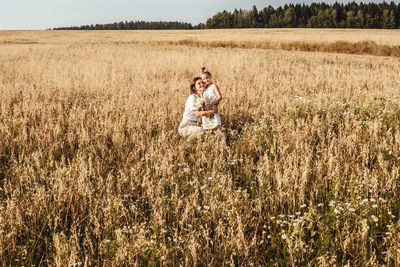 Young couple on field