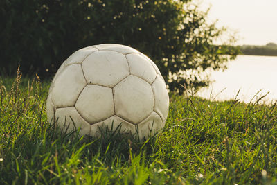 Close-up of soccer ball on grass