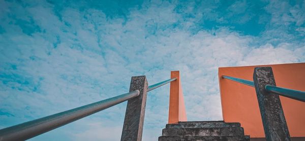 Low angle view of bridge against building