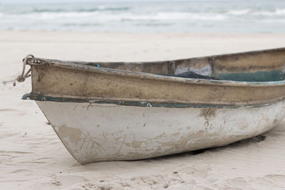 Old row boat left on the beach