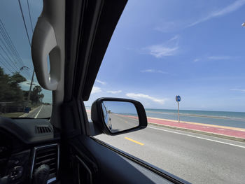 Road seen through car window