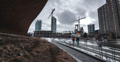 Modern buildings in city against sky