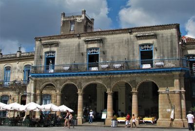 People in front of historical building