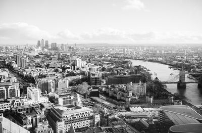 High angle shot of river along cityscape