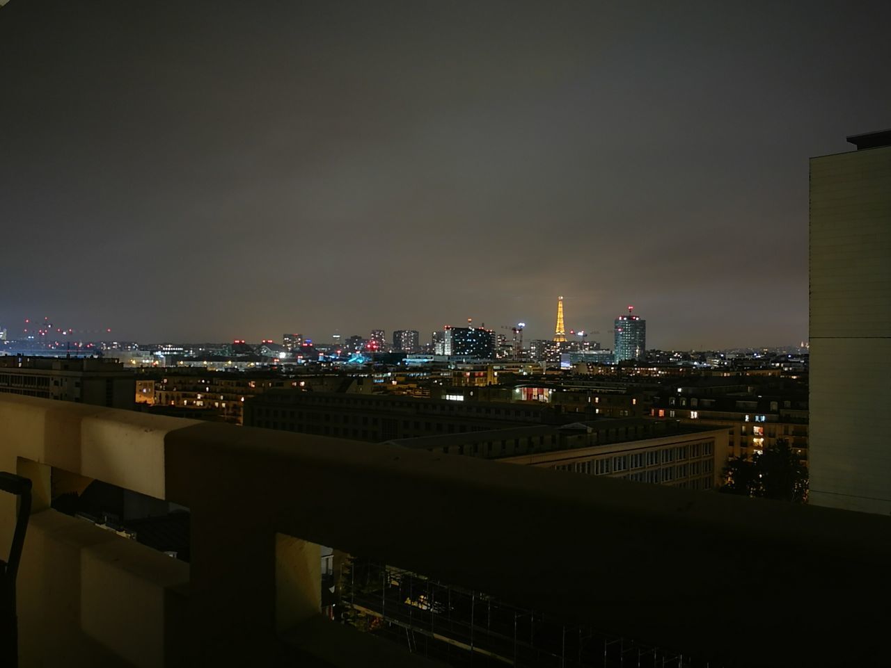 illuminated, night, city, architecture, cityscape, building exterior, built structure, sky, urban skyline, skyscraper, outdoors, residential building, no people