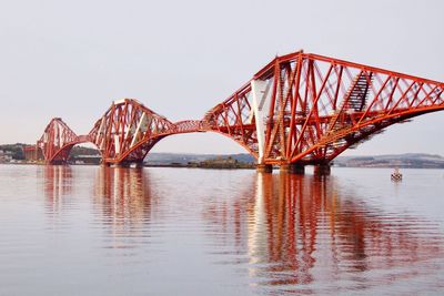 Bridge over sea against sky