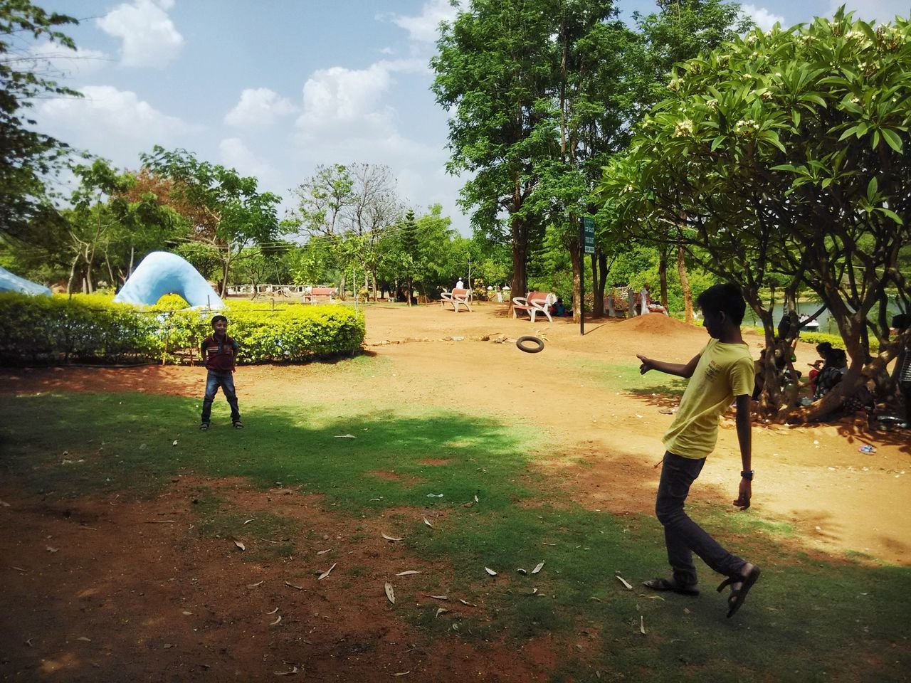 MEN IN PARK