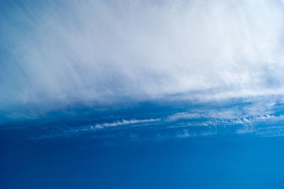 Low angle view of sea against dramatic sky